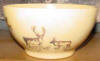 Ahgupuk caribou on yellow ceramic bowl