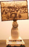 Ceramic Billikin lamp with Ahgupuk lamp shade reindeer scene